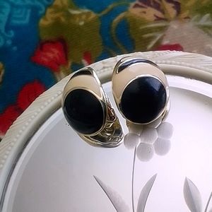 Vintage Avon signed round clip-on earrings in black and off-white